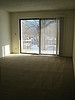 Property Image 3159Spacious living room with patio/deck access & lots of light